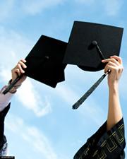 Graduates holding mortar boards graphic.